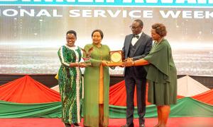 The Chief Guest Tourism and Wildlife Cabinet Secretary Rebecca Miano being gifted