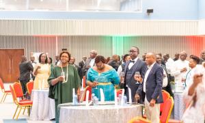 Probation and Aftercare Services Secretary Dr. Christine Obondi, Commissioner General of Prison Patrick Aranduh joined by partners raise glasses for a toast